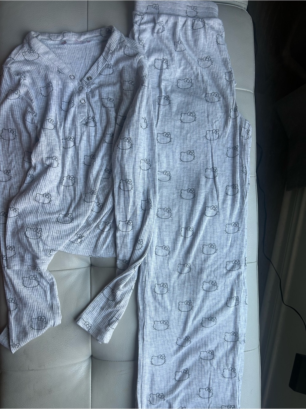 Hello Kitty size 7/8 pajamas set. 
50th anniversary limited edition.